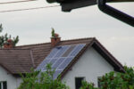 Installing A Solar Cell On A Roof. High Quality Photo